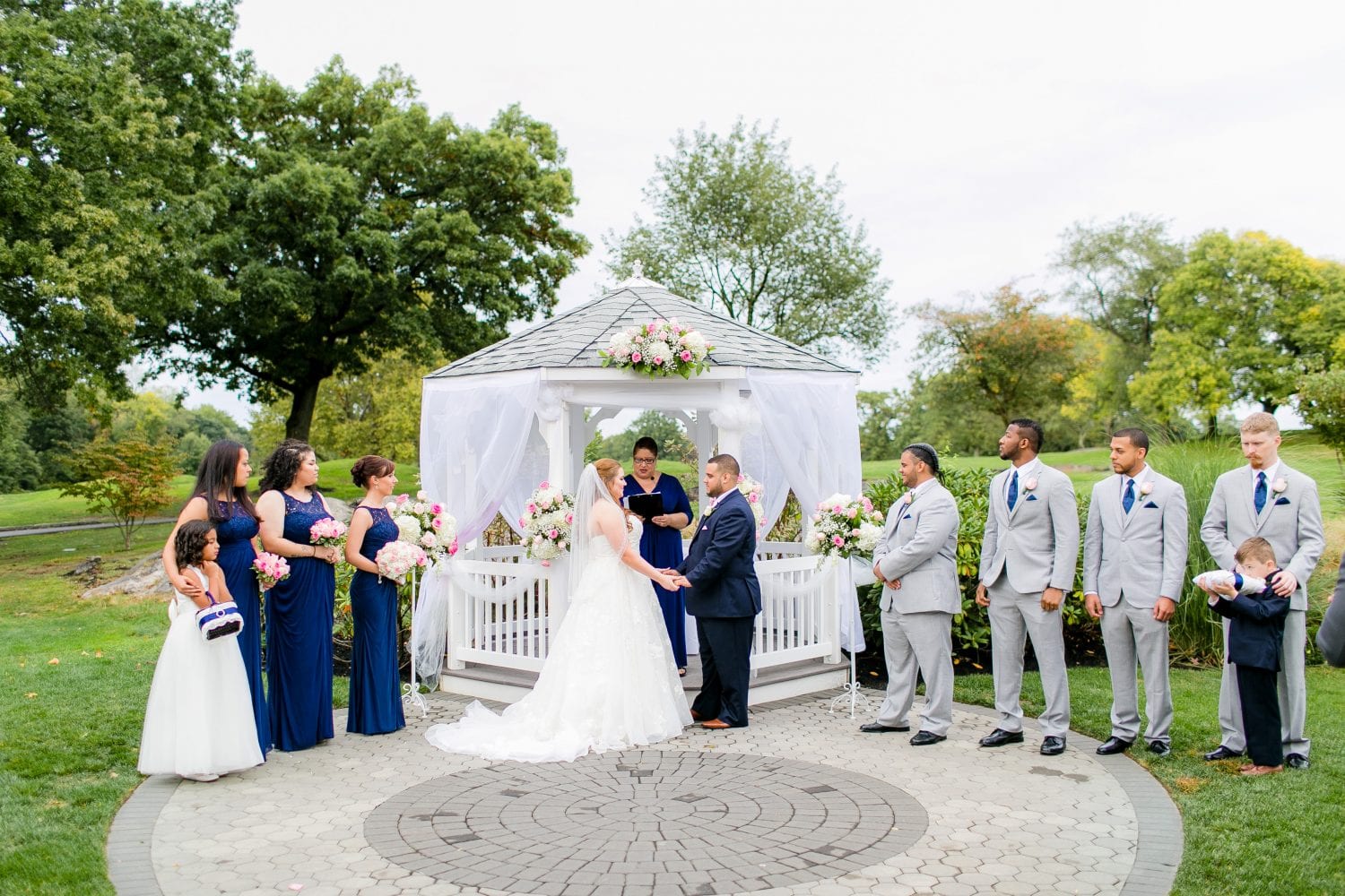 223 Washington DC wedding DJs standing in front of a gazebo.