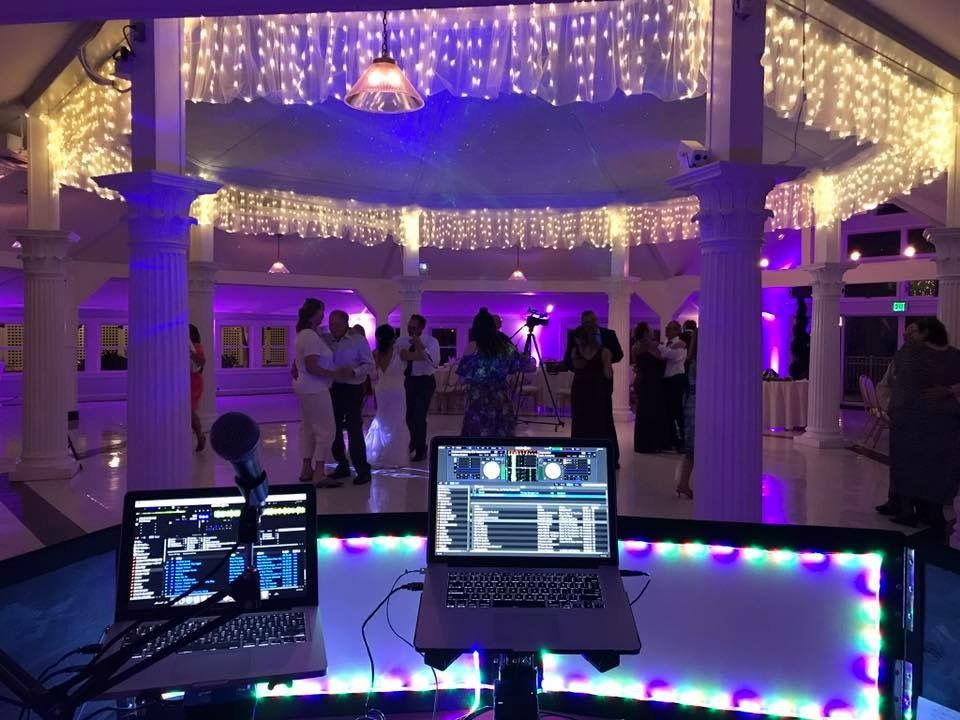 DJ Set Up 4 A dj set up in a room with purple lights, featuring Virginia DJs.