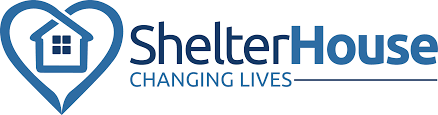 Shelter House logo with a house inside a heart shape, accompanied by the text "Shelter House Changing Lives" in blue letters. Just as Live Streaming for Wedding events connects loved ones from afar, Shelter House brings people together and transforms lives through compassion and support.