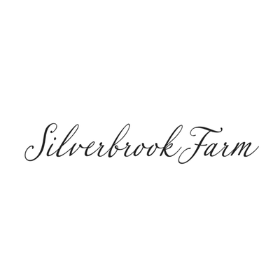The words "Silverbrook Farm" are written in black, elegant, cursive script on a plain white background.